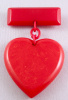 BP110 red bakelite heart/bar pin